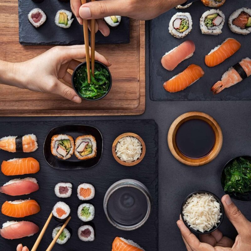 sharing-eating-sushi-food-1-scaled-e1664742144646